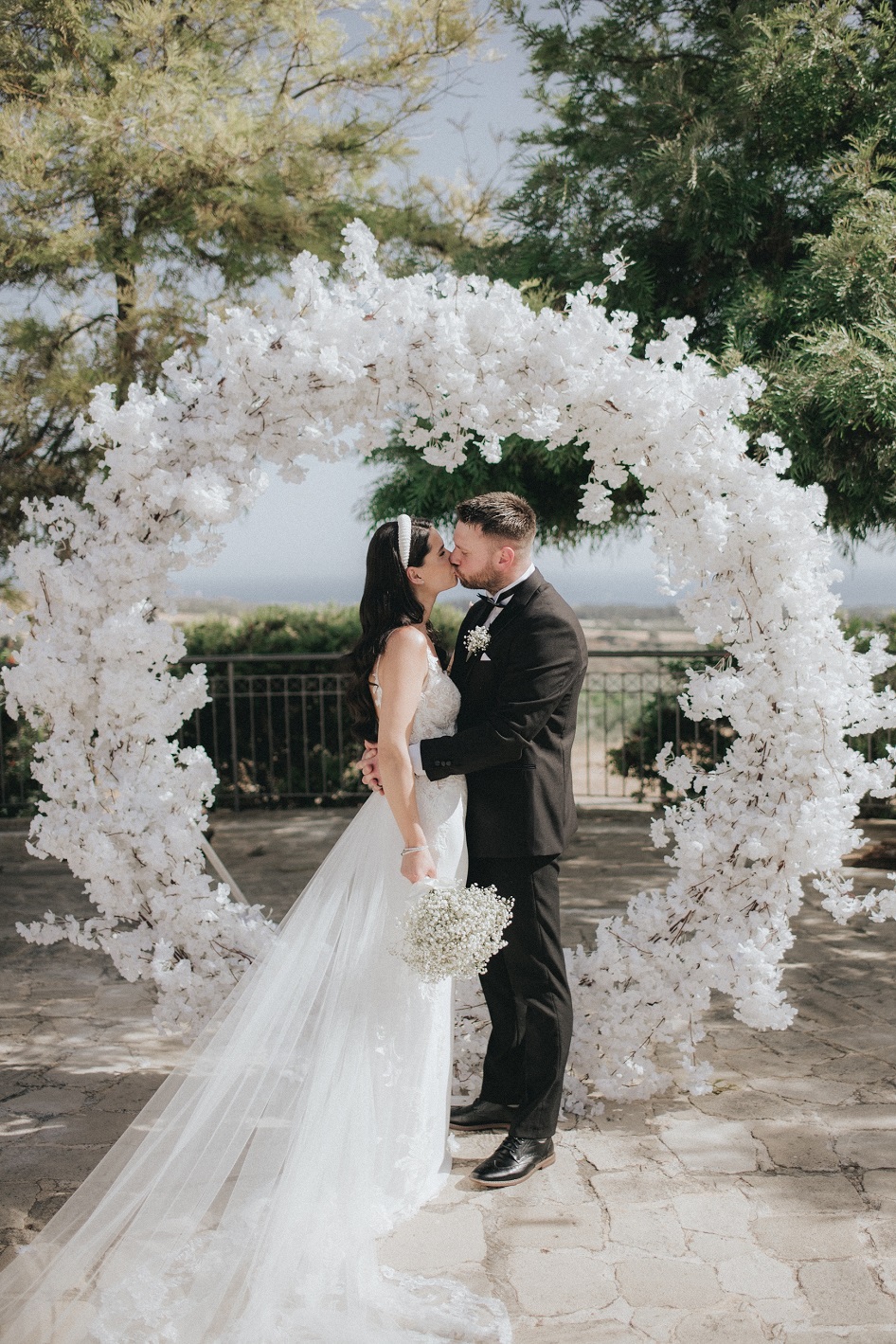 Blossom arch and round moongate ceremony decoration at Liopetro venue Paphos